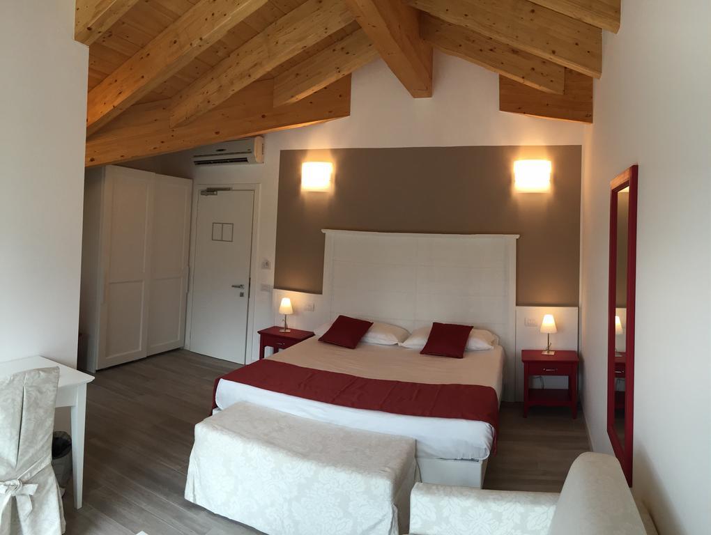 Hotel Resort Le Vele Домасо Стая снимка